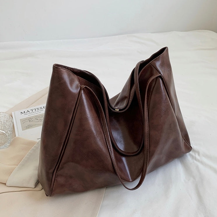 Amara | Bolso de mano de cuero retro