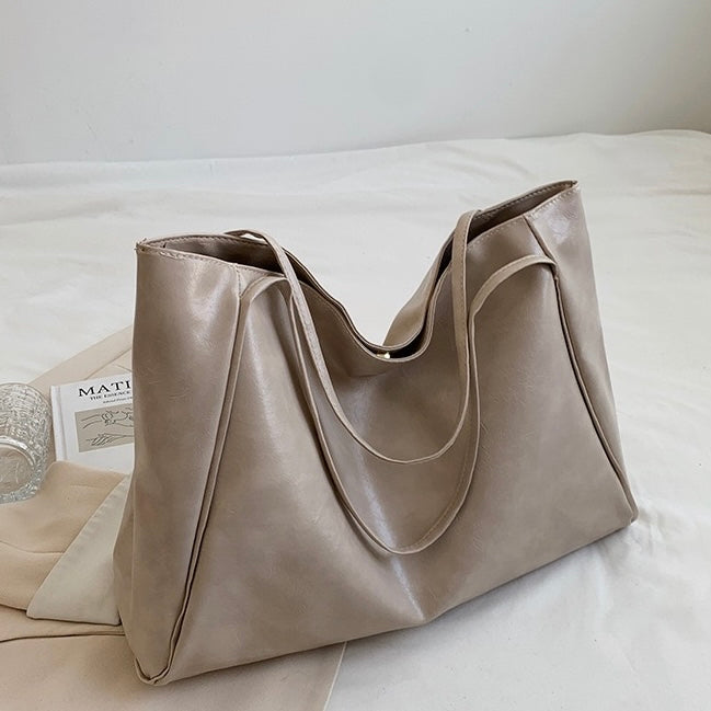Amara | Bolso de mano de cuero retro